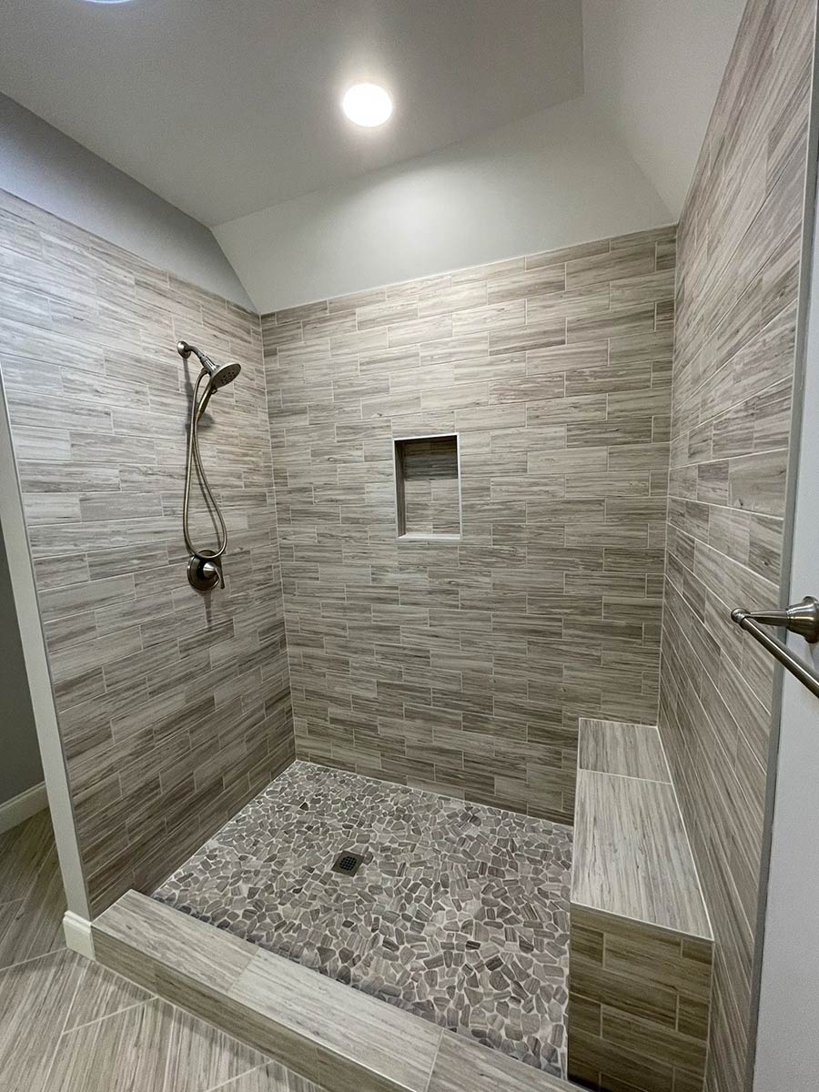 Photo of bathroom remodel by Closer Look General Contracting